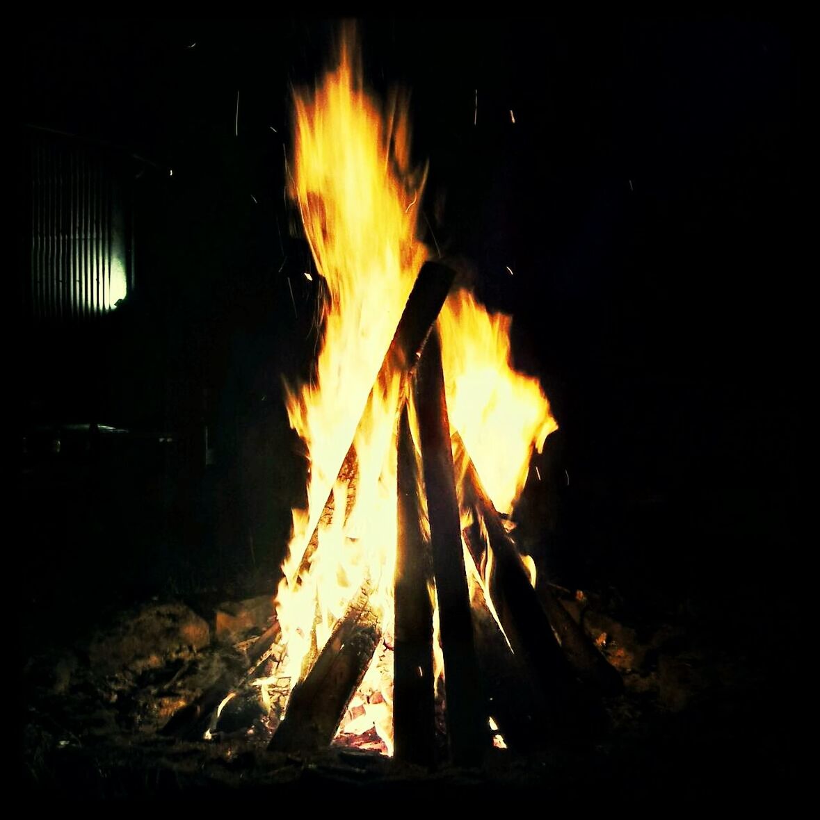 flame, burning, fire - natural phenomenon, heat - temperature, bonfire, firewood, glowing, fire, night, heat, campfire, wood - material, fireplace, orange color, dark, close-up, wood, log, danger, motion