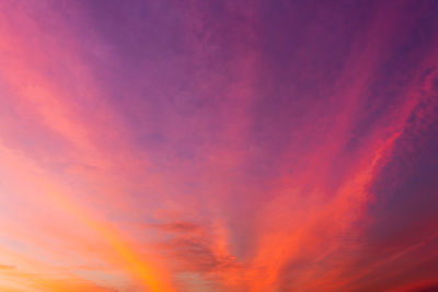 Low angle view of dramatic sky during sunset