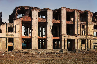 Abandoned building against sky