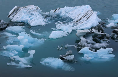 High angle view of iceberg in sea