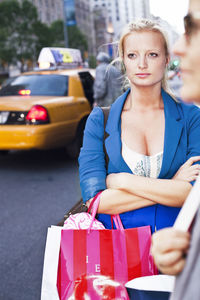 Young woman with shopping bags