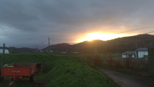 Scenic view of landscape against sky during sunset