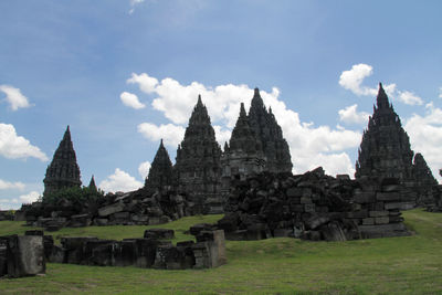 View of temple on building against sky