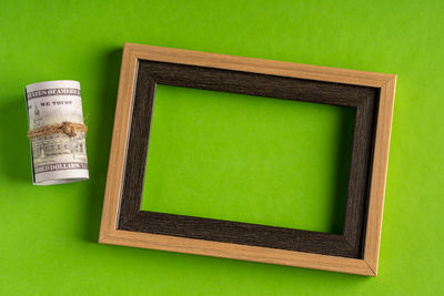 Close-up of green table against white background