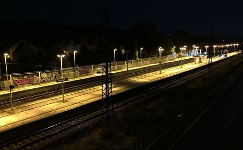 View of railway tracks at night