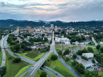 Aerial view of asheville, north carolina. city with blue ridge mountains in the back