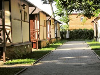 Narrow paved footpath between houses