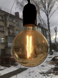 Close-up of illuminated light bulb