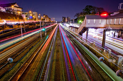 High angle view of light trails on railroad