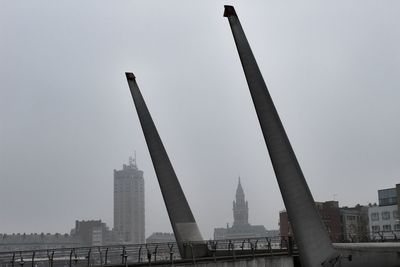 Modern buildings against sky in city