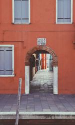 Alley amidst buildings in city