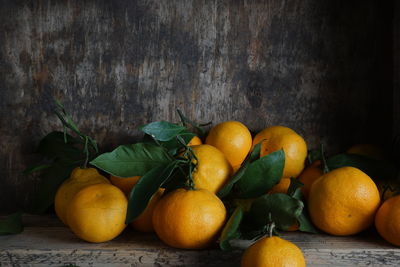 Close-up of orange fruits on table