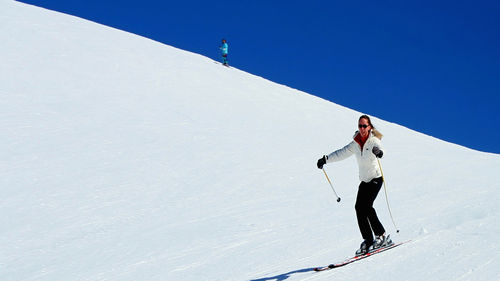 Woman jumping on landscape