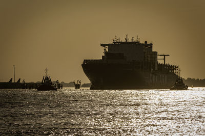 Silhouette of ship at sunset