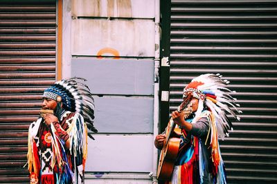 Men performing on street