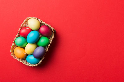 Directly above shot of easter eggs on yellow background