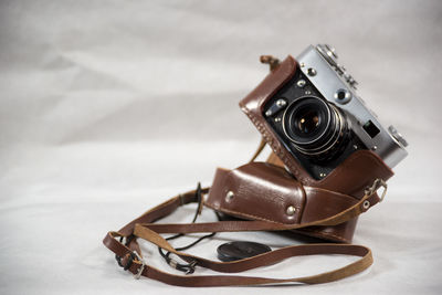 Close-up of camera on table