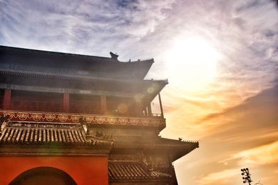 Low angle view of building against sky during sunset