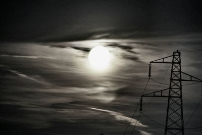 Low angle view of moon against sky during sunset
