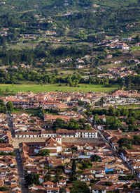 High angle view of townscape and trees in city