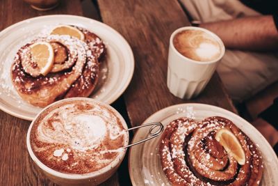 High angle view of coffee served on table