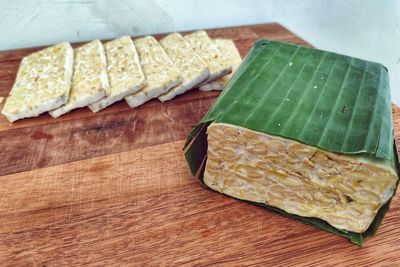 High angle view of bread on cutting board