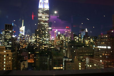 Illuminated cityscape at night