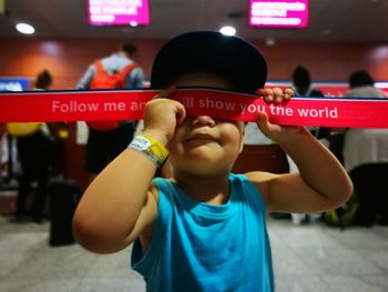 Midsection of man using phone