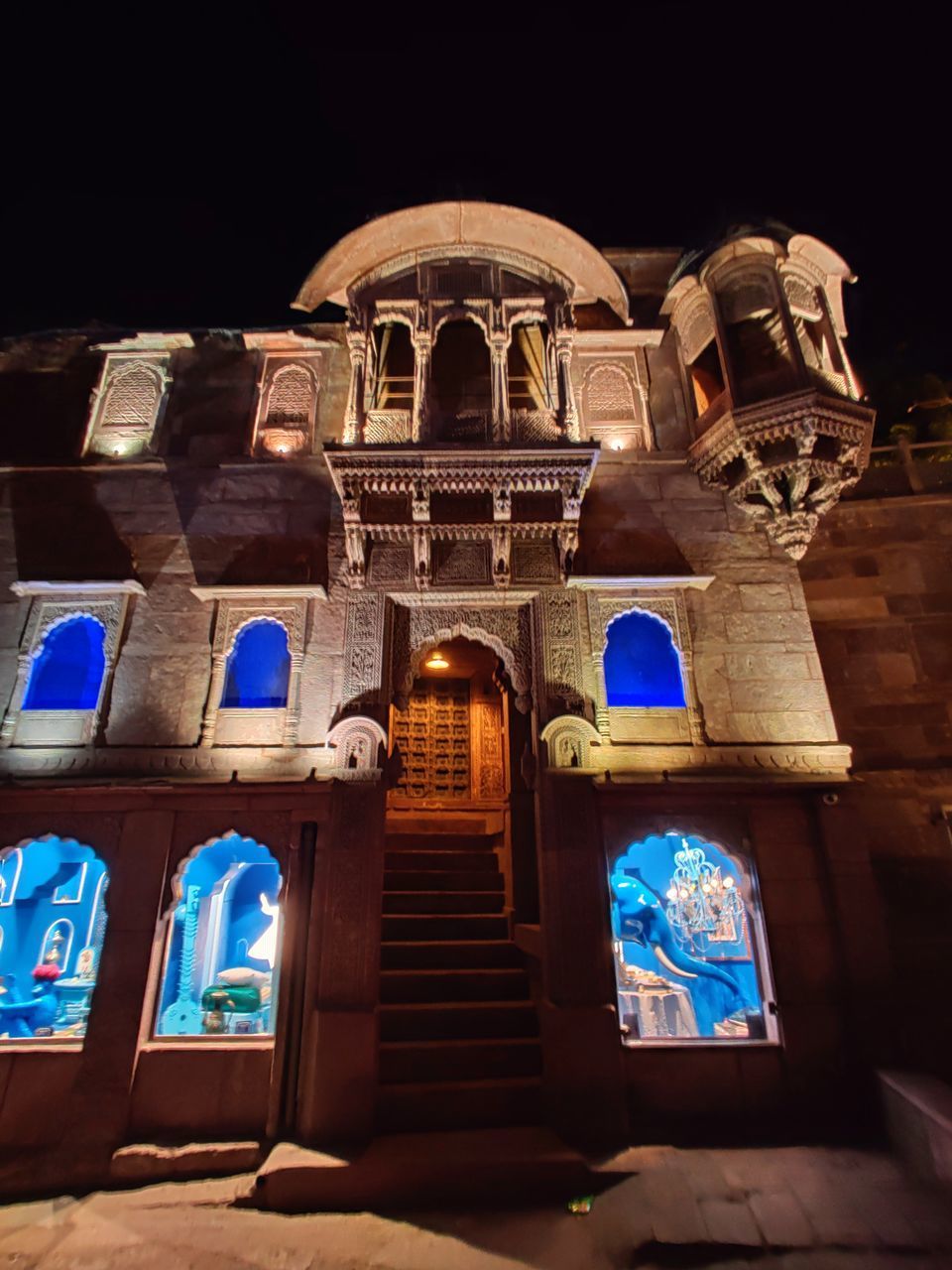 LOW ANGLE VIEW OF ILLUMINATED HISTORICAL BUILDING