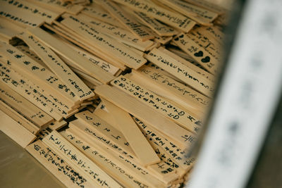 High angle view of wooden prayer blocks