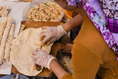 High angle view of woman preparing food