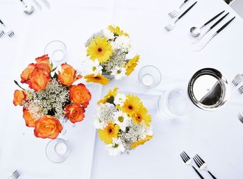 High angle view of various flowers on table