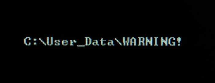 Close-up of illuminated text against black background