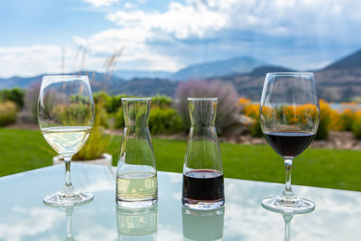 Glass of wine glasses on table