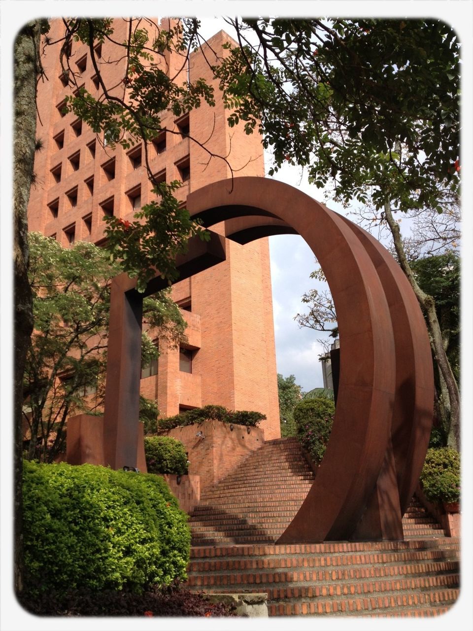 built structure, architecture, tree, transfer print, auto post production filter, building exterior, arch, plant, growth, old, sky, day, steps, no people, outdoors, history, green color, entrance, wall - building feature, house