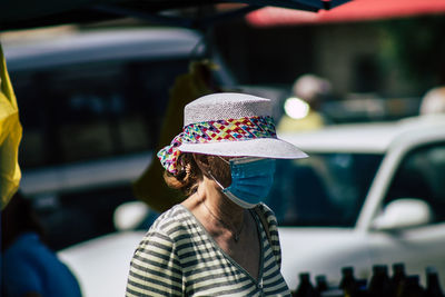 Rear view of woman in hat