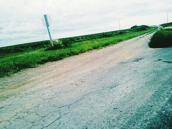 Road passing through field