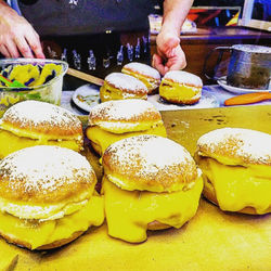 Close-up of person preparing food