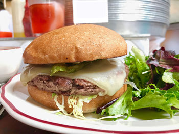 Close-up of burger in plate on table