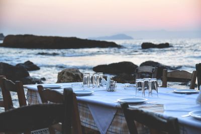 View of chairs and tables on beach