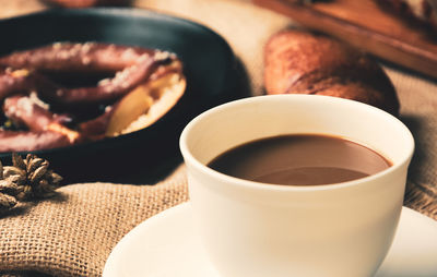 High angle view of coffee cup on table