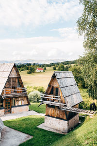 House on field against sky