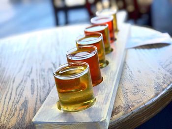 Close-up of beer in glasses on table