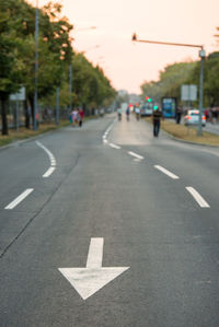 Arrow symbol on road in city