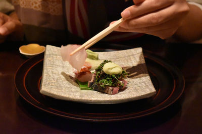 Close-up of hand holding food