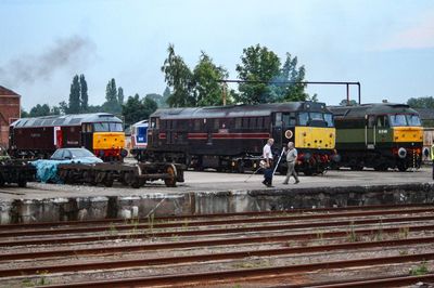 Train on railroad tracks against sky