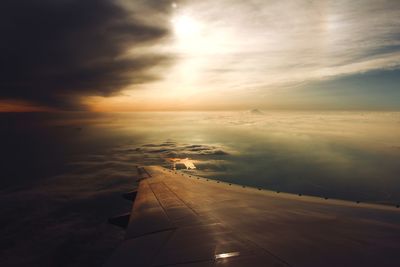 Aerial view of cloudscape against sky during sunset