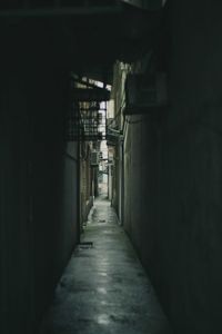 Empty alley amidst buildings