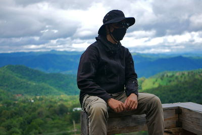 Man sitting on mountain