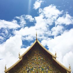 Low angle view of ornate building against sky